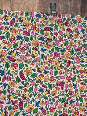 Lush Garden Buds  This knot wrap 100% organic cotton ladybug mushroom tulip leaf